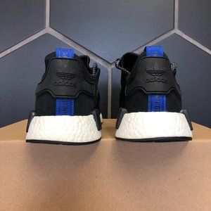 nmd black blue tab